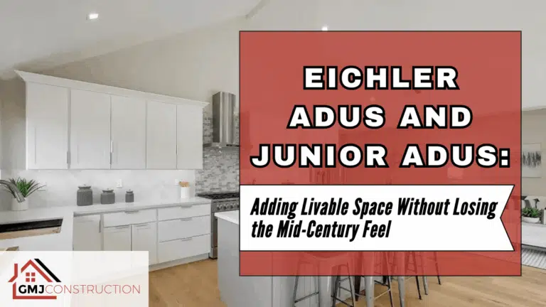 Modern kitchen with white cabinets and decorative red sign