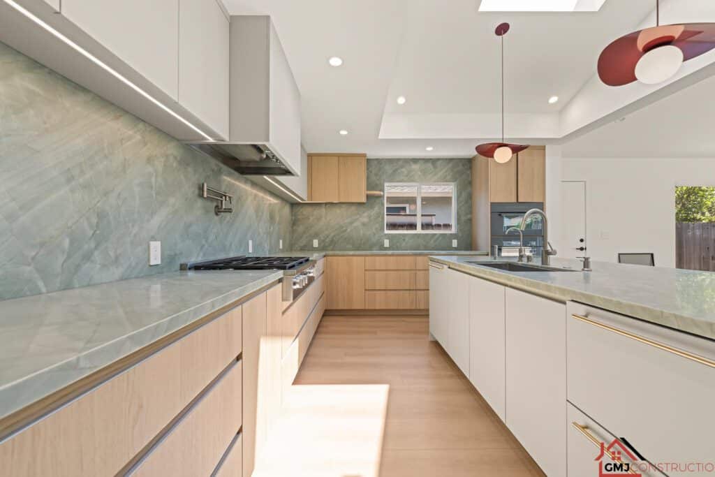 Kitchen work aisle between the island and the range-side cabinetry