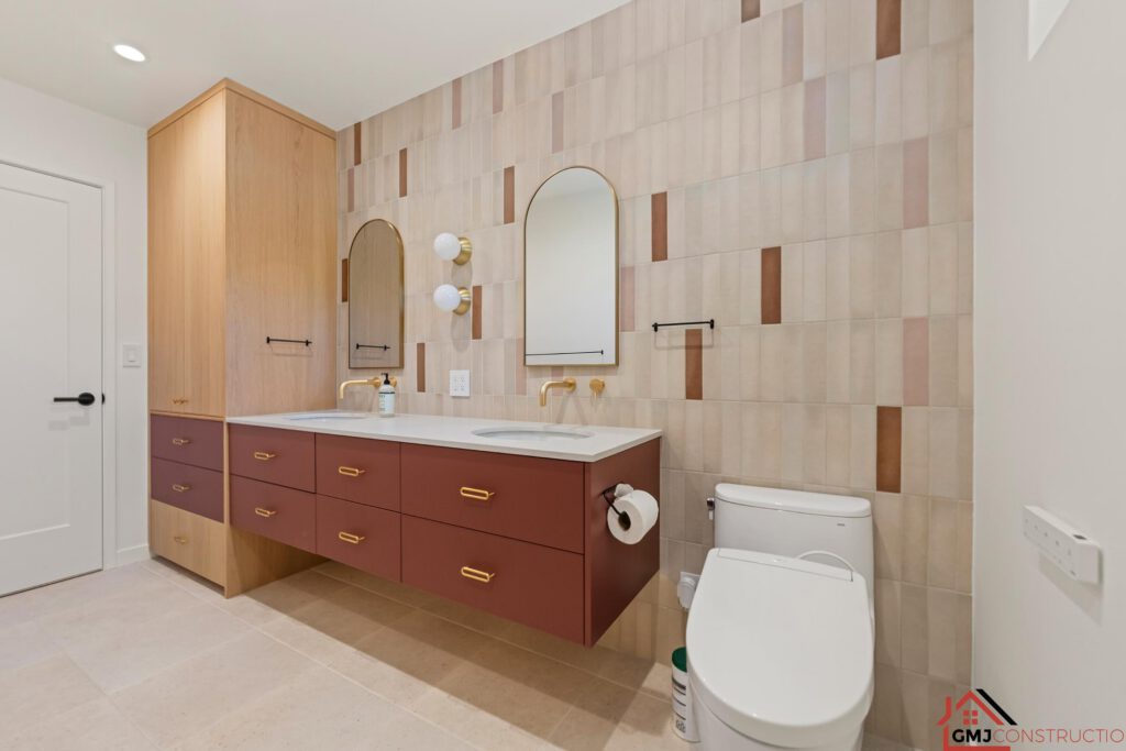 Rust-toned floating double vanity with white sinks and arched mirrors